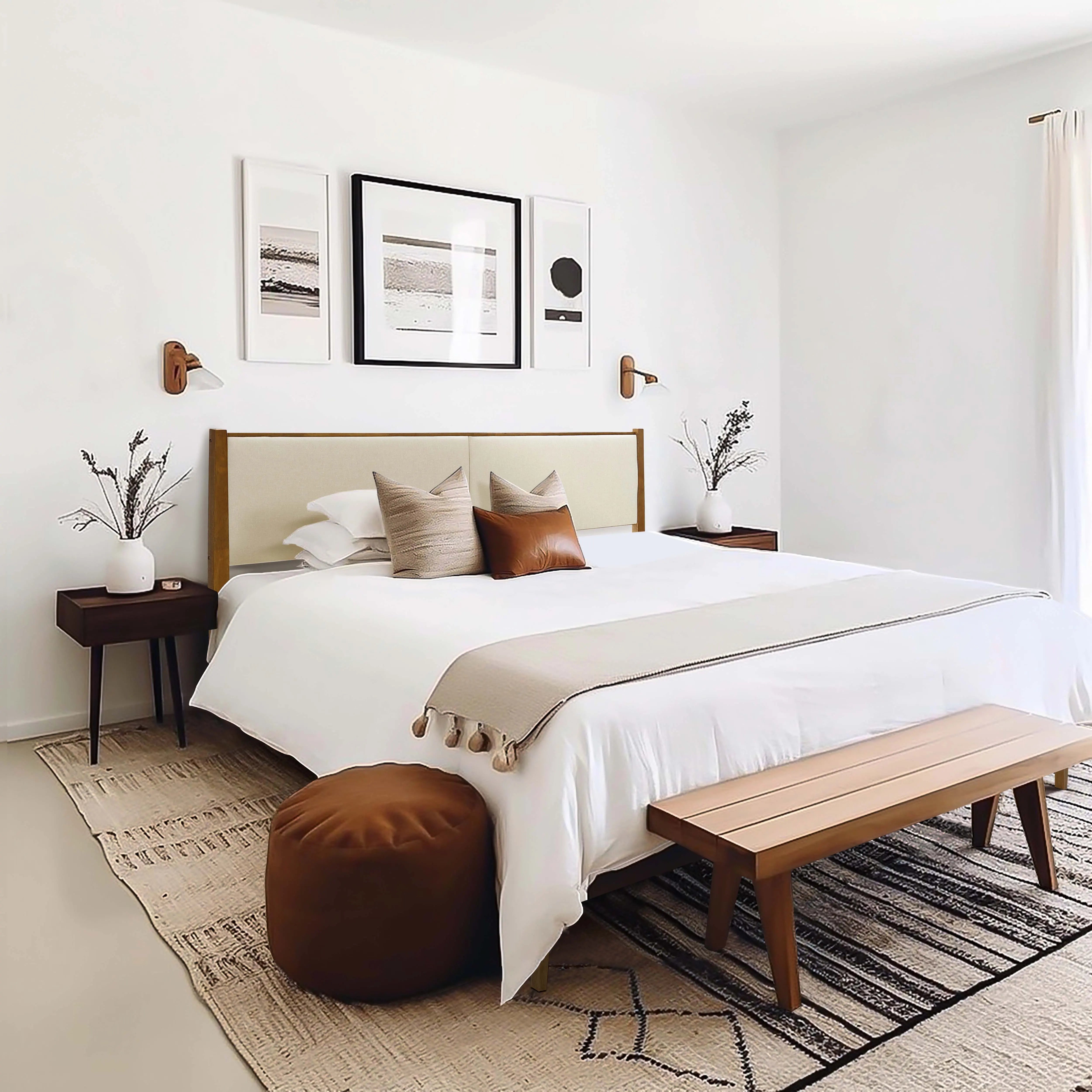 bedroom-featuring-a-white-bed-a-wooden-bench-and-a-rug