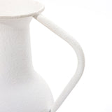 Close-up of a white, textured metal pitcher with a curved handle against a plain white background, embodying modern minimalist design. Perfect as part of your table vase set, this piece effortlessly elevates your home decor.