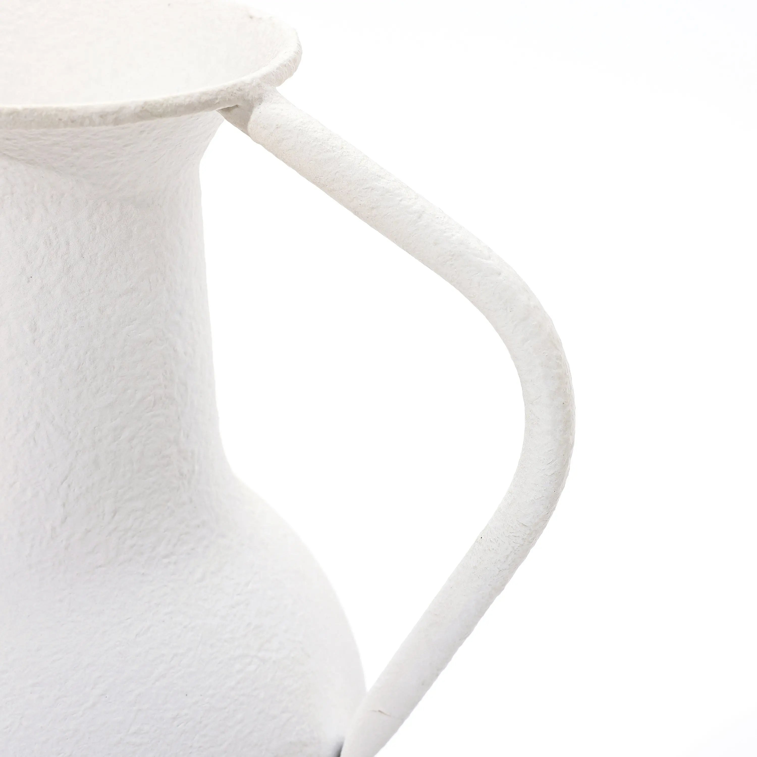Close-up of a white, textured metal pitcher with a curved handle against a plain white background, embodying modern minimalist design. Perfect as part of your table vase set, this piece effortlessly elevates your home decor.