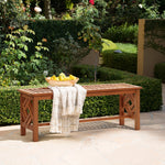wooden-bench-and-a-basket-of-lemons-in-a-garden-setting