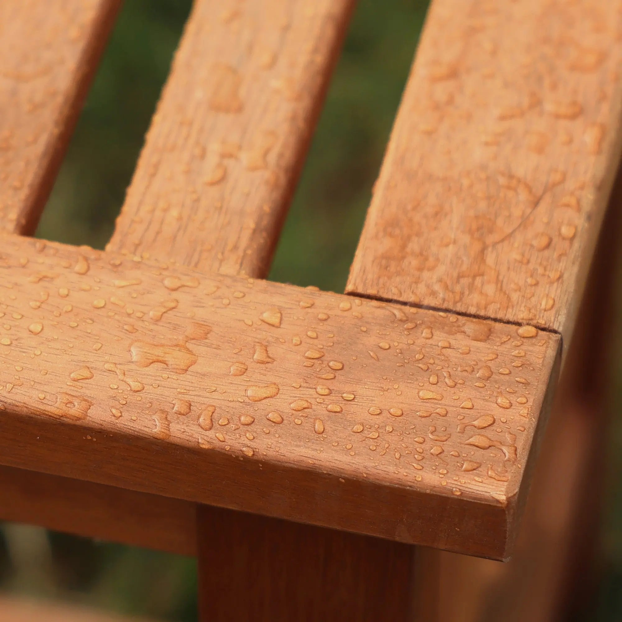 wooden-bench-with-water-droplets-on-it