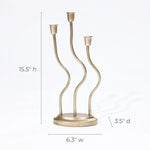 This elegant candle holder features a three-armed metal design with graceful waves, making it a perfect addition to your home decor. Measuring 15.5 high, 6.3 wide, and 3.5 deep, its both striking and sophisticated.