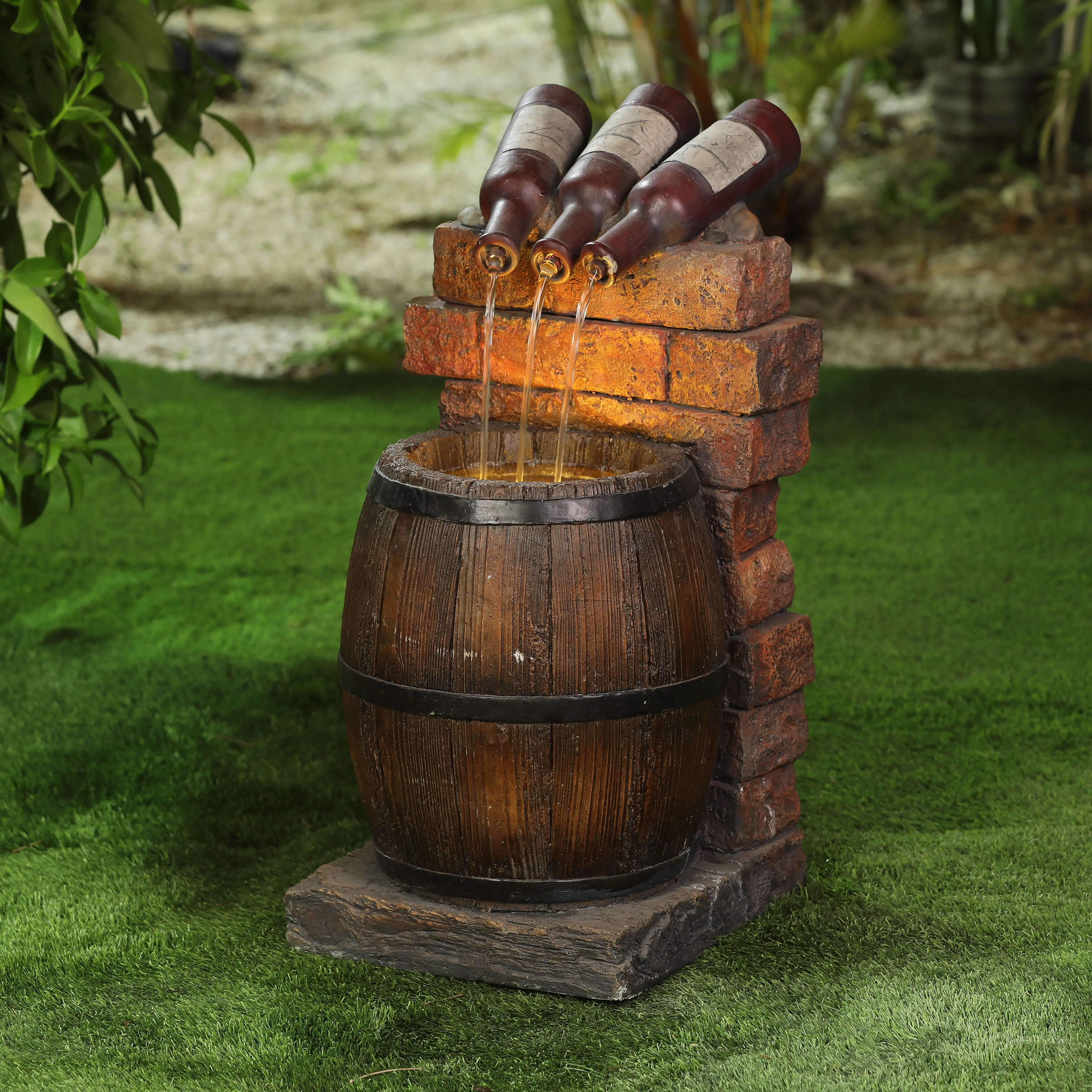 outdoor-fountain-with-water-from-bottles-leaking-into-wood-barrels