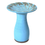 blue glazed ceramic bird bath