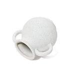 A textured white ceramic vase with a vintage-inspired spherical body and three curved handles, lying gracefully on its side.