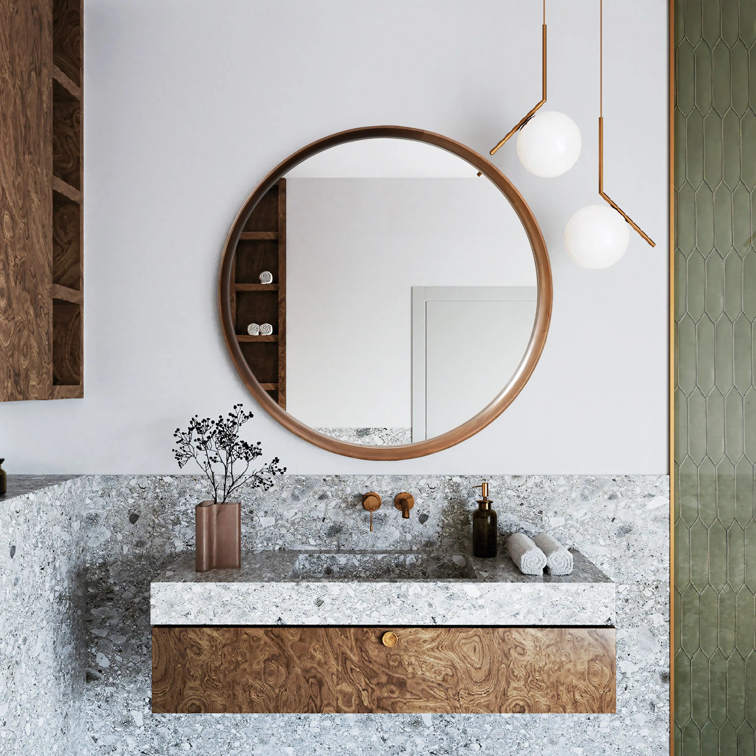 Modern bathroom with a wooden round wall mirror, wood and stone vanity, and two hanging globe lights. A vase with branches and rolled towels adorn the counter, all complemented by a natural wood finish.