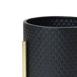 Close-up of a black textured cylindrical container with a diamond pattern, featuring a vertical brass handle on the side. This contemporary modern style planter is perfect for any space, adding both elegance and function to your decor.