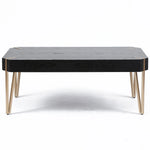 a-black-leather-and-brass-coffee-table