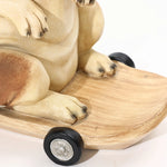 Close-up of a durable resin sculpture depicting a kangaroo sitting on a skateboard, perfect for adding an eclectic style decor touch.