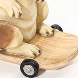 Close-up of a durable resin sculpture depicting a kangaroo sitting on a skateboard, perfect for adding an eclectic style decor touch.