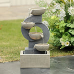 cascading-water-fountain-in-backyard