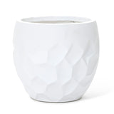 A white textured ceramic planter features a striking geometric pattern and a smooth rim, perfect for both indoor and outdoor use.