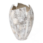 A textured, oval-shaped decorative piece with a wide opening and abstract broken egg design, this ceramic vase features shades of gray and off-white.