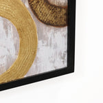 Close-up of a framed painting featuring abstract gold circular patterns on a textured gray backdrop, perfect as sophisticated wall decor.