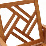 wooden-chair-with-a-criss-cross-pattern